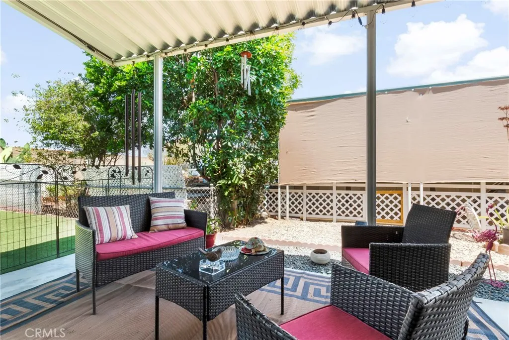 3700 Buchanan Street, Unit 108 Riverside, CA 92503 - Photo 19 of 31 a outdoor living space with furniture and a potted plant