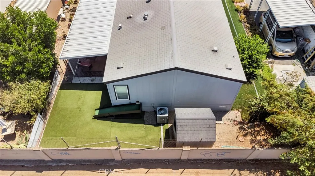 3700 Buchanan Street, Unit 108 Riverside, CA 92503 - Photo 22 of 31 an aerial view of a house with a yard