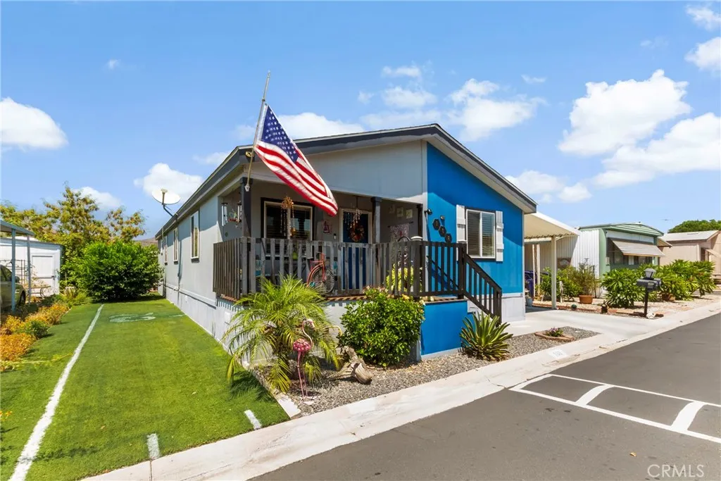 3700 Buchanan Street, Unit 108 Riverside, CA 92503 - Photo 3 of 31 a front view of a house with garden