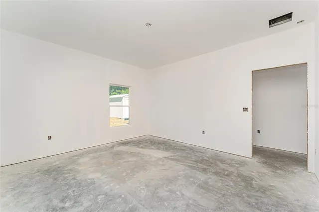 an empty room with windows