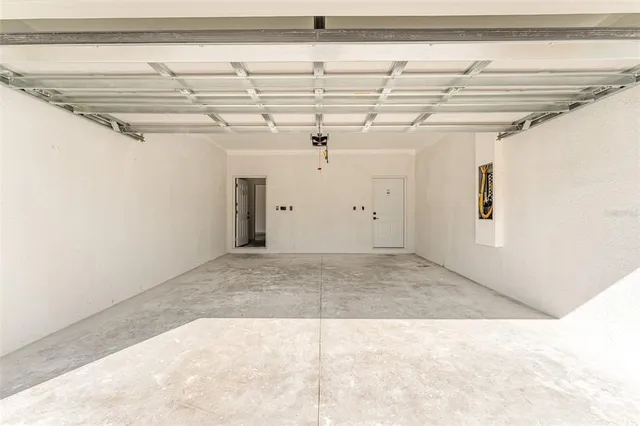 a view of a room with a hallway