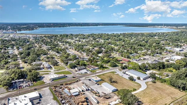 an aerial view of residential building and ocean