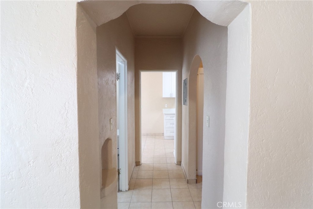 925 North Lacy Street, Unit 4 Santa Ana, CA 92701 - Photo 7 of 20 a view of a bathroom from a corridor