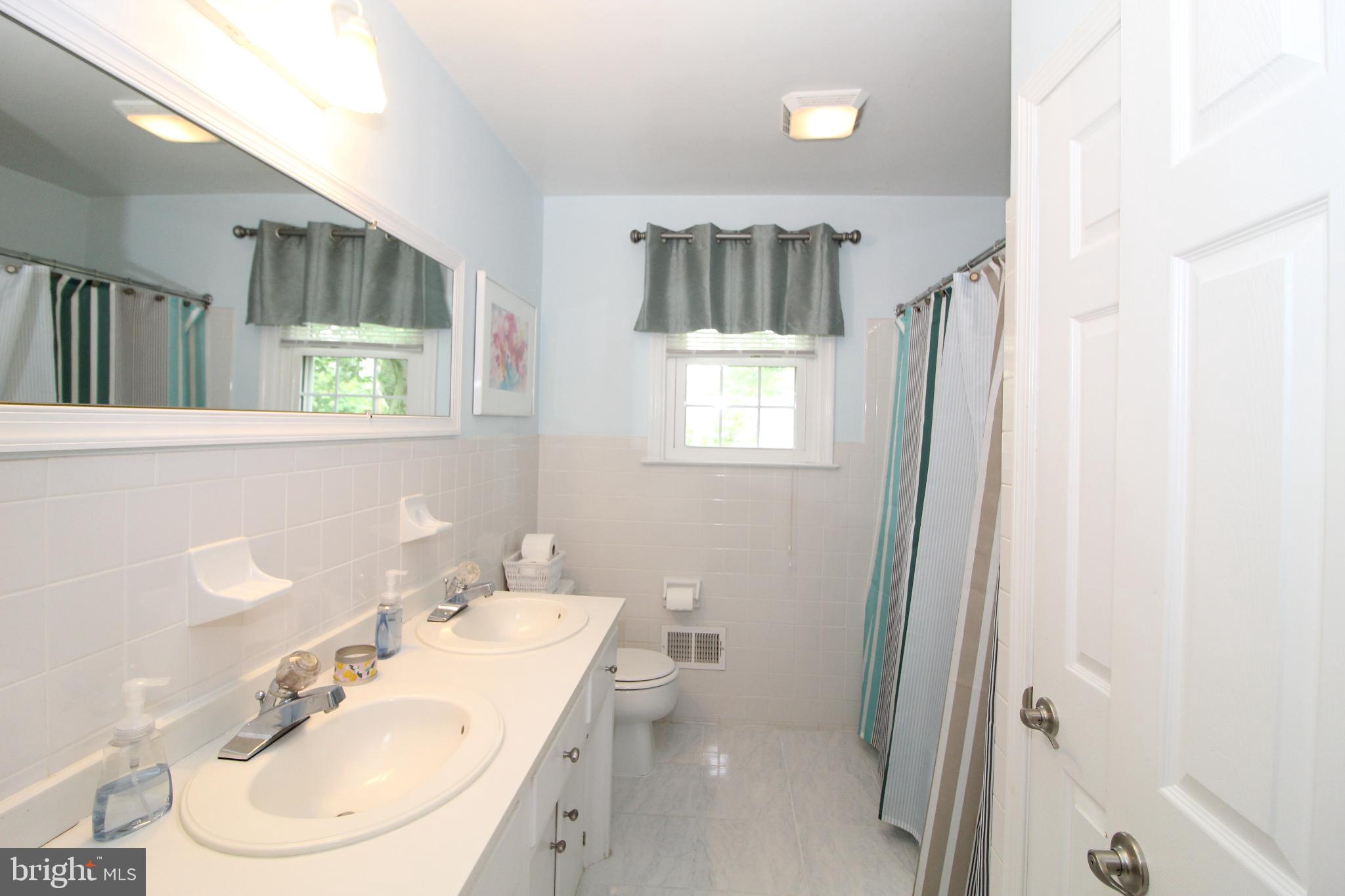 729 Halstead Road Wilmington, DE 19803 - Photo 22 of 25 Updated Hall Bathroom with Double Sinks & Closet