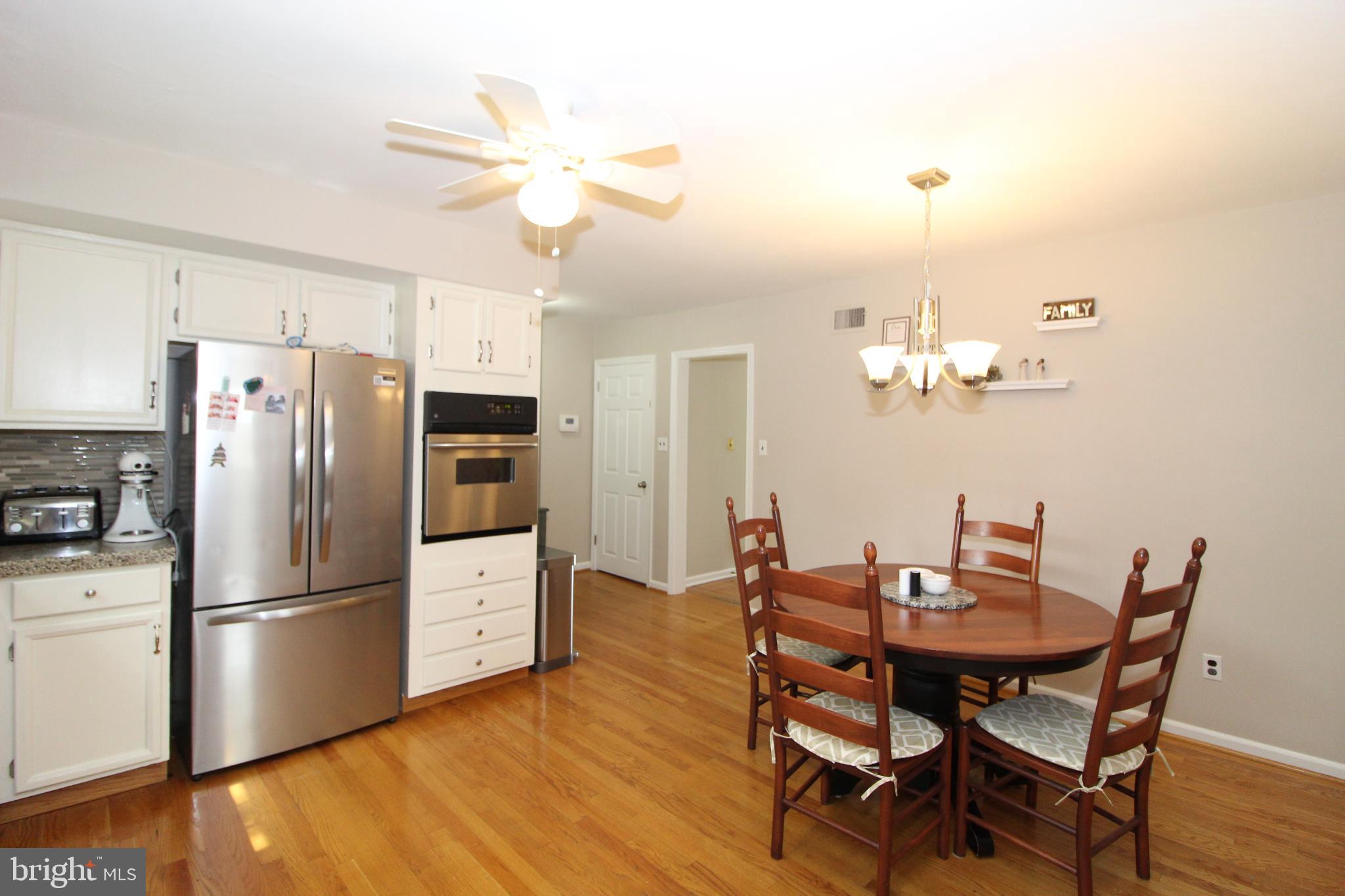 Large Eat-in Kitchen with Granite Overlay Counters