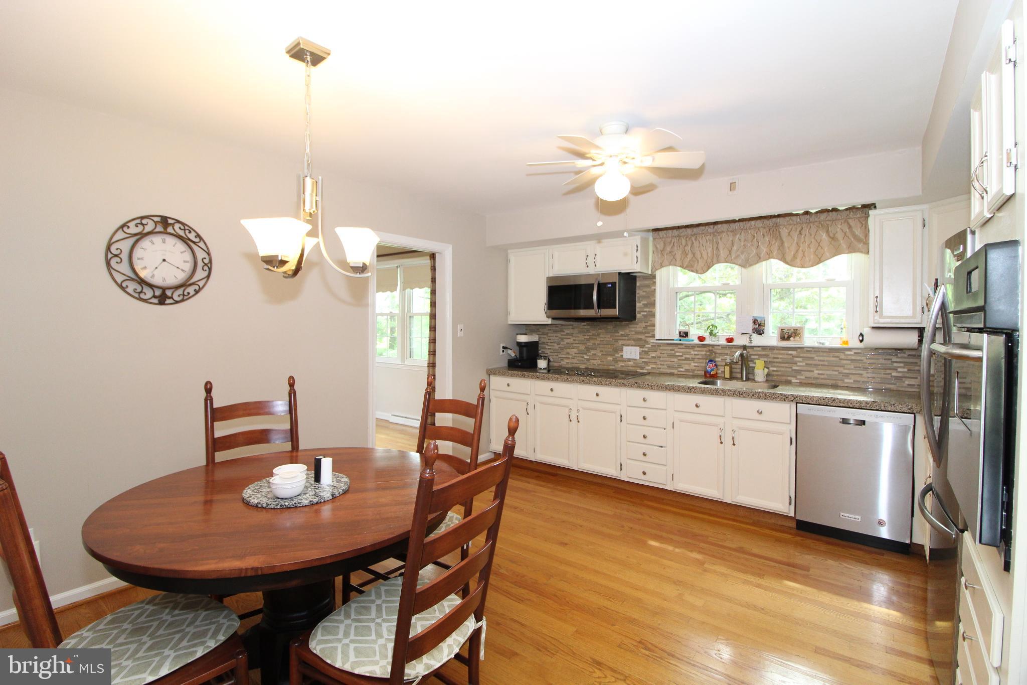 729 Halstead Road Wilmington, DE 19803 - Photo 8 of 25 Kitchen with Five Burner Range & Microwave