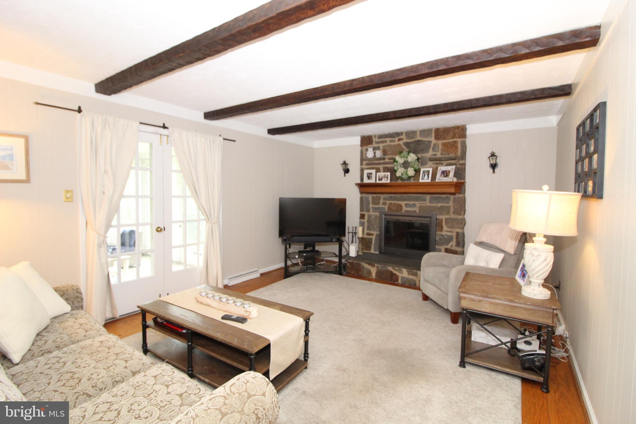 729 Halstead Road Wilmington, DE 19803 - Photo 10 of 25 Cozy Family Room with Stone Fireplace
