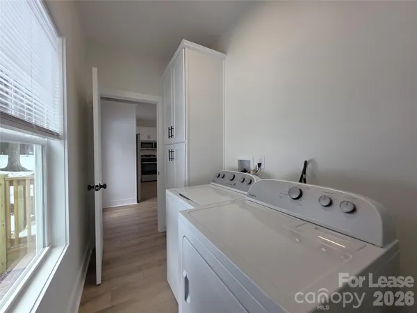 a view of bathroom with dual sinks