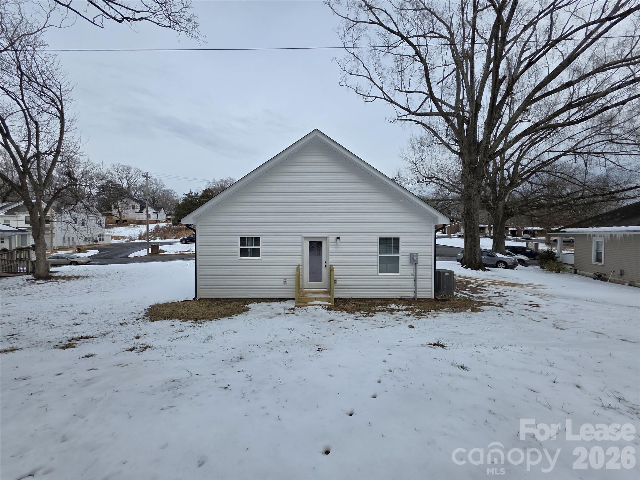 126 Heath Street Albemarle, NC 28001 - Photo 16 of 16 a view of a house with a snow in the yard