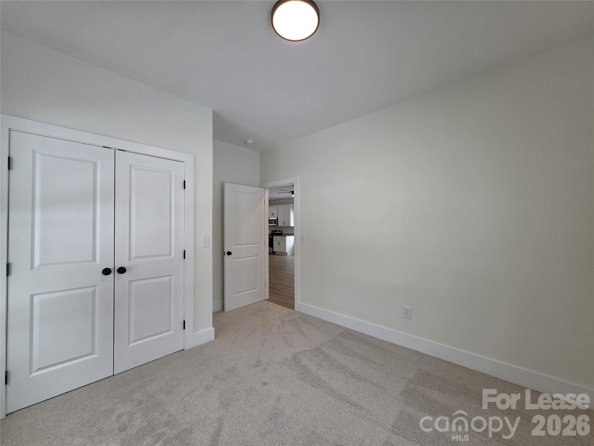 126 Heath Street Albemarle, NC 28001 - Photo 8 of 16 a view of an empty room