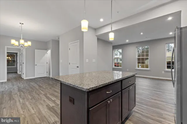 a bathroom with a sink and a window