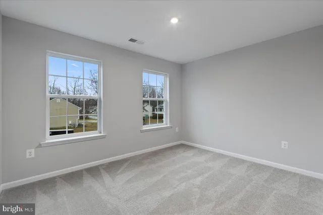 a view of a house with a roof deck