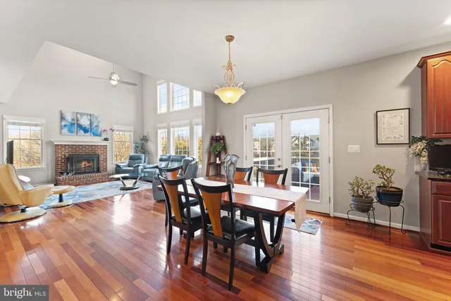 a en suite bathroom with a granite countertop sink and a mirror
