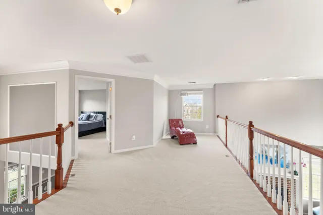 a view of livingroom with hardwood floor and a ceiling fan
