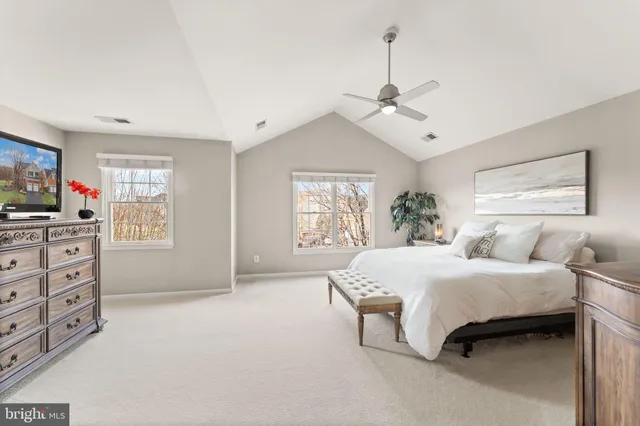 an aerial view of a house with a ocean view