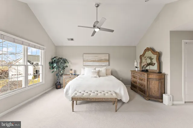 a view of a patio with couches table and chairs