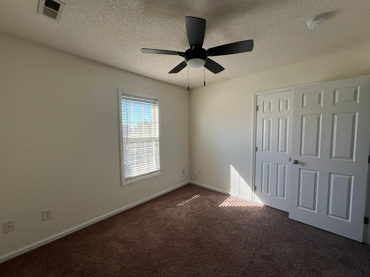 100 Dover Court East Sanford, NC 27332 - Photo 14 of 20 a view of an empty room with a window