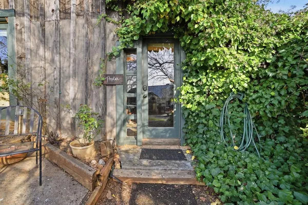 a backyard of a house with lots of green space