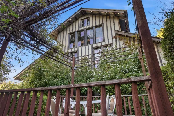 a view of a building with a yard