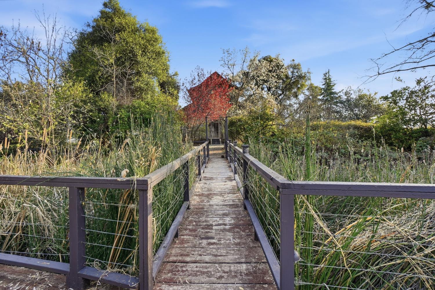 21645 Parrotts Ferry Road Sonora, CA 95370 - Photo 49 of 95 Deck at the pond facing the Chapel