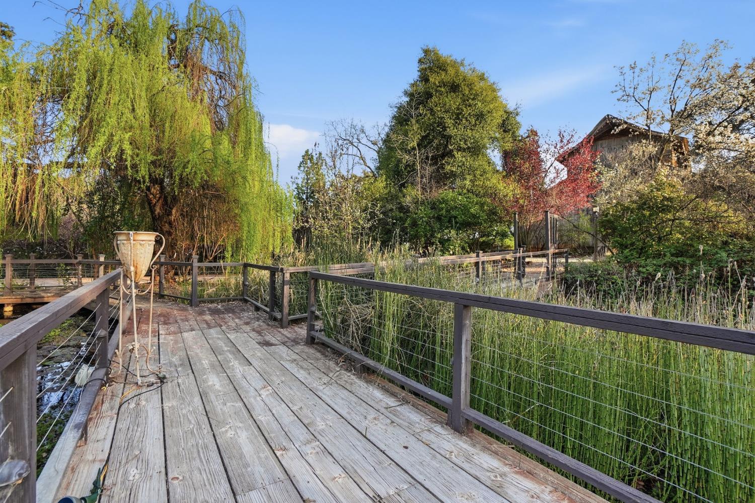 21645 Parrotts Ferry Road Sonora, CA 95370 - Photo 50 of 95 Deck over the pond by the Chapel