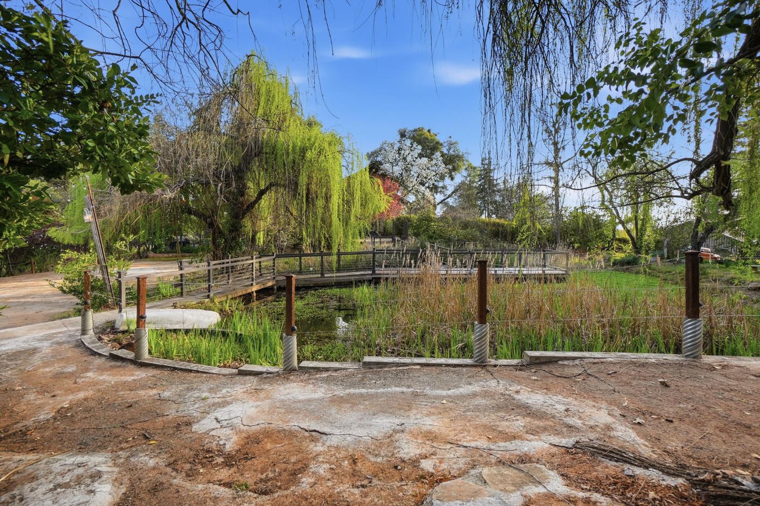 21645 Parrotts Ferry Road Sonora, CA 95370 - Photo 51 of 95 View of the pond with the Chapel