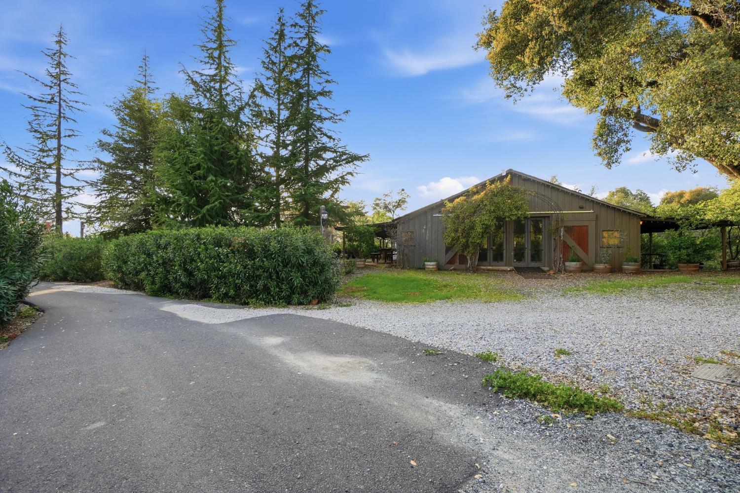 21645 Parrotts Ferry Road Sonora, CA 95370 - Photo 54 of 95 a view of a house with a yard