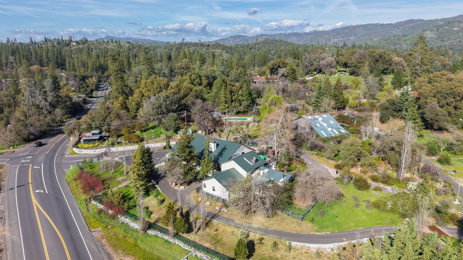21645 Parrotts Ferry Road Sonora, CA 95370 - Photo 85 of 95 an aerial view of residential houses with outdoor space