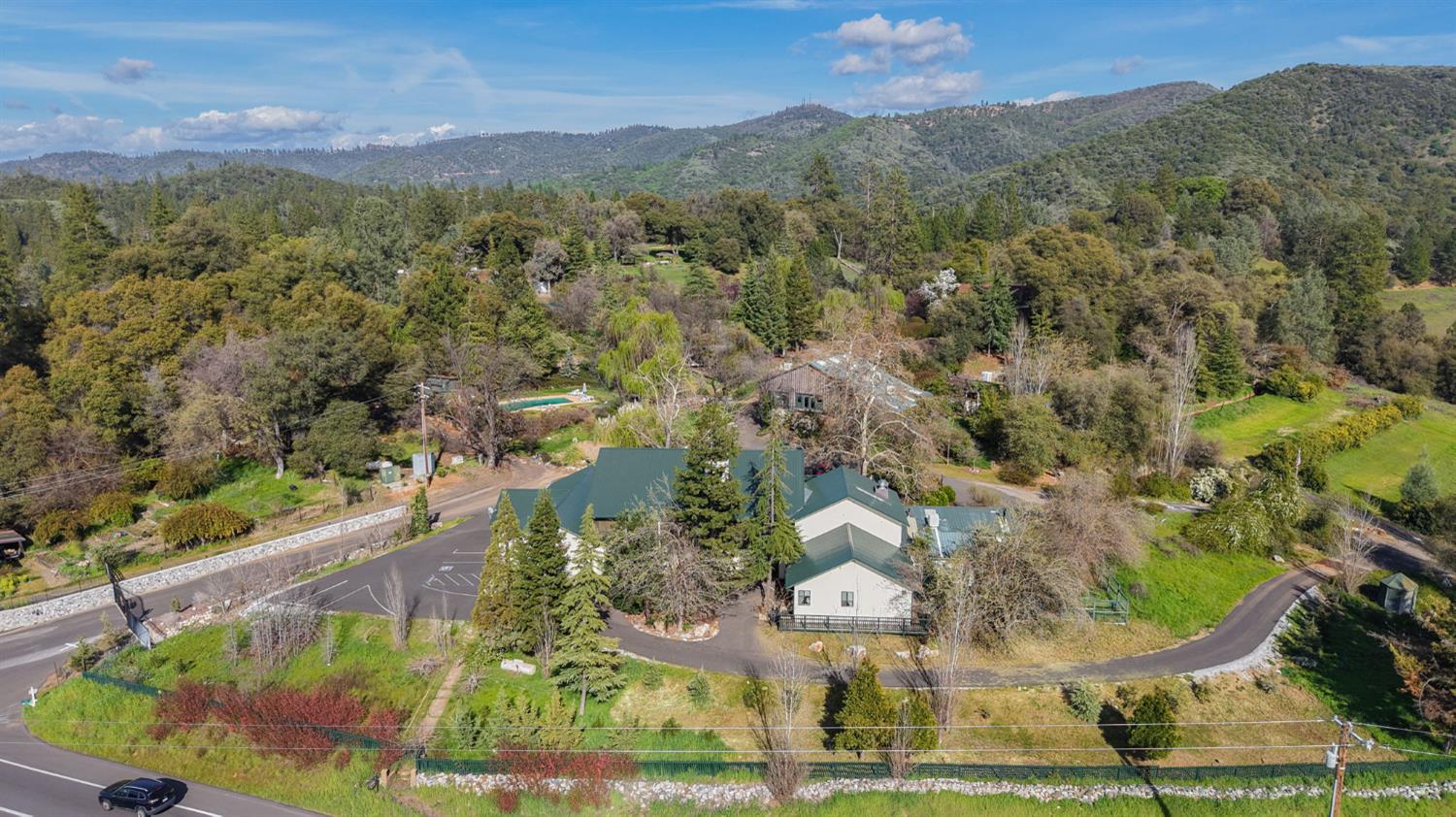 21645 Parrotts Ferry Road Sonora, CA 95370 - Photo 86 of 95 an aerial view of a house with a yard