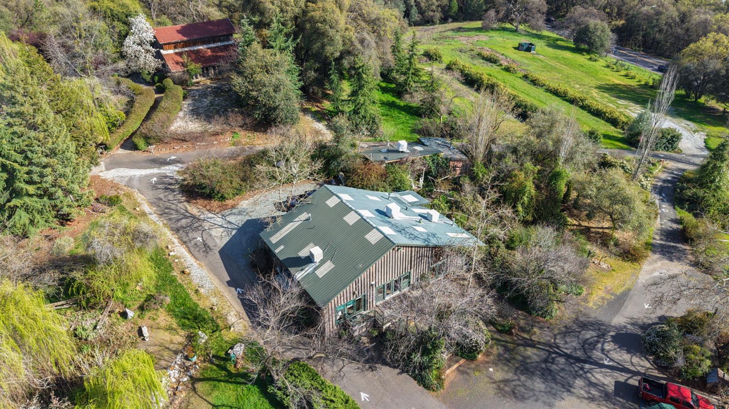 21645 Parrotts Ferry Road Sonora, CA 95370 - Photo 87 of 95 an aerial view of a house with a yard