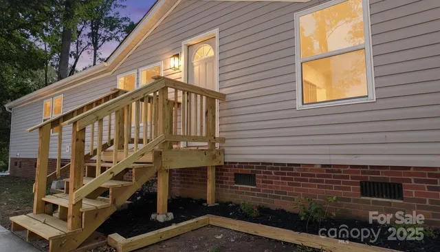 a view of a house with a street