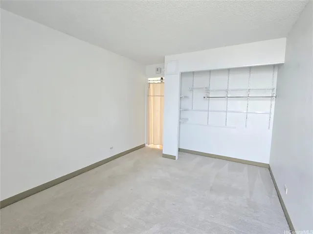 an empty room with closet