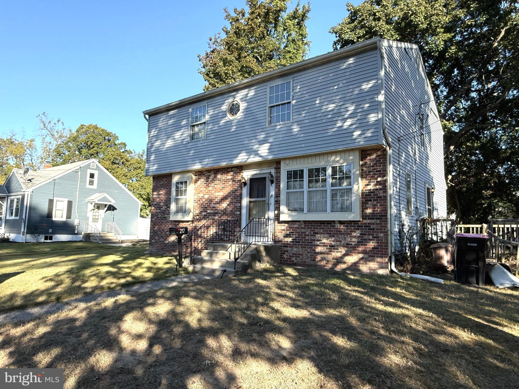 217 3rd Avenue Glendora, NJ 08029 - Photo 1 of 17 a view of a house with a yard