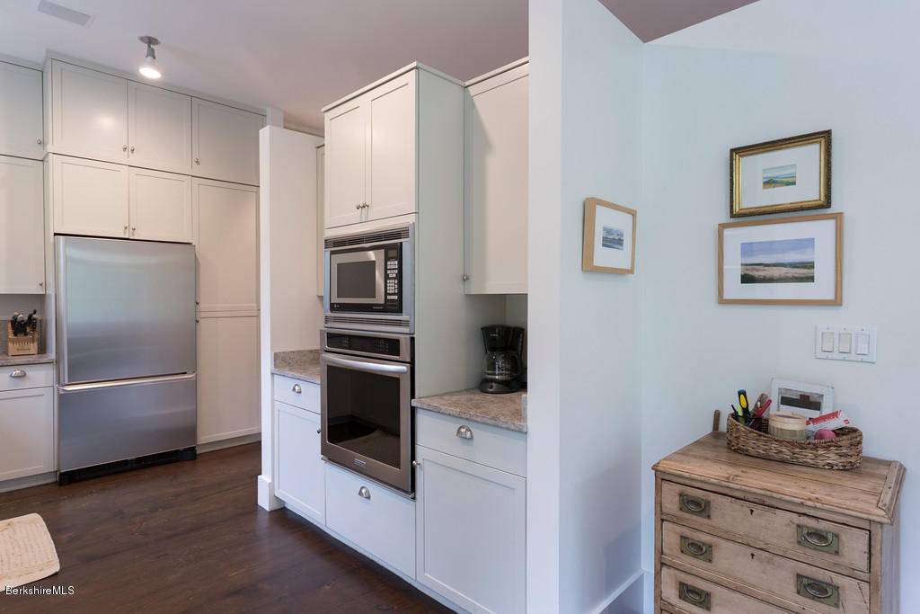 1 Mahkeenac Road Stockbridge, MA 01262 - Photo 7 of 32 a kitchen with stainless steel appliances and refrigerator
