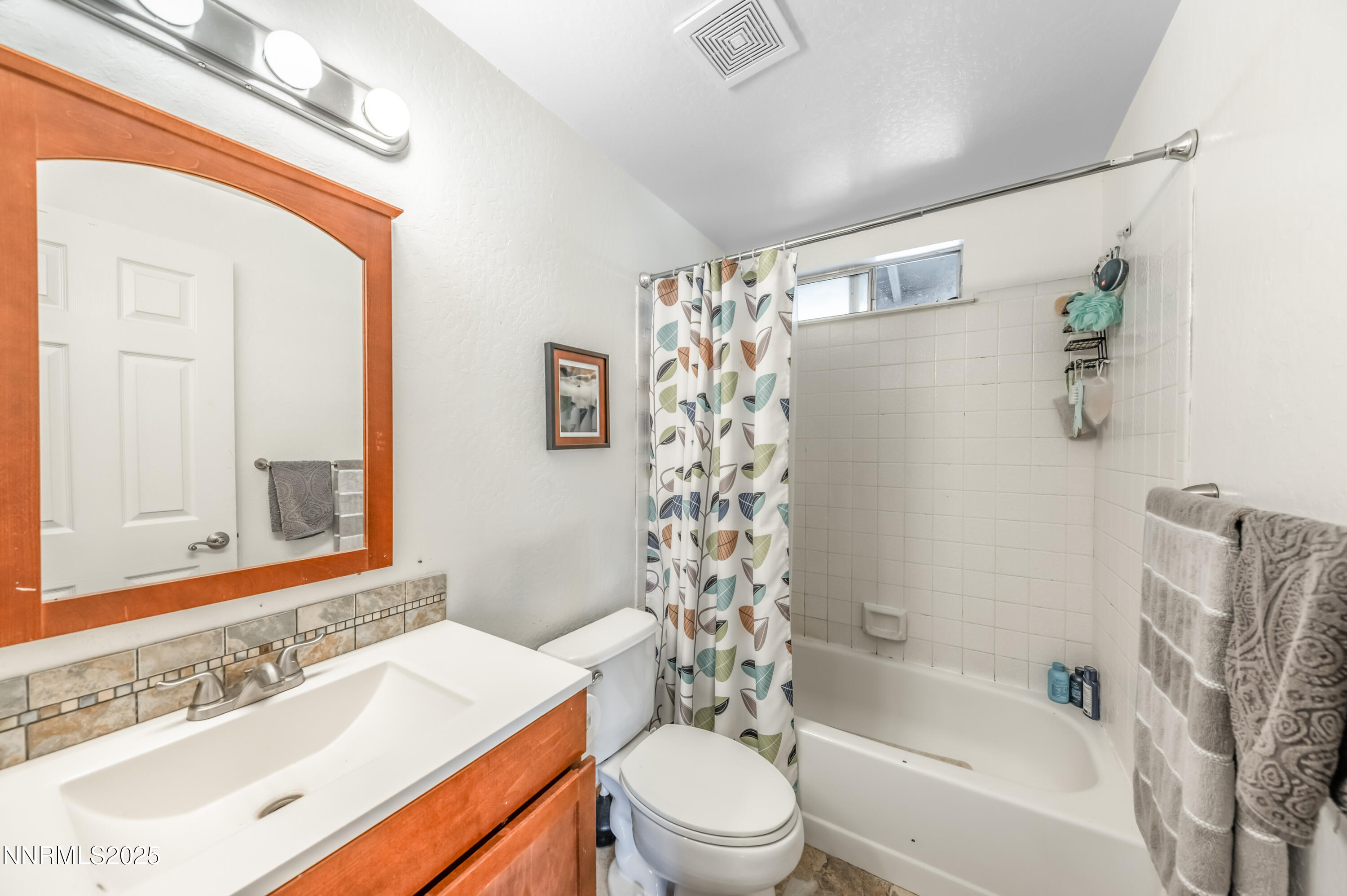 1185 Westlake Road Reno, NV 89523 - Photo 12 of 26 a bathroom with a sink a toilet and a bathtub
