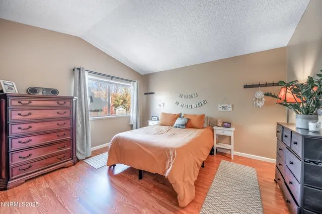 a view of a house with backyard porch and sitting area