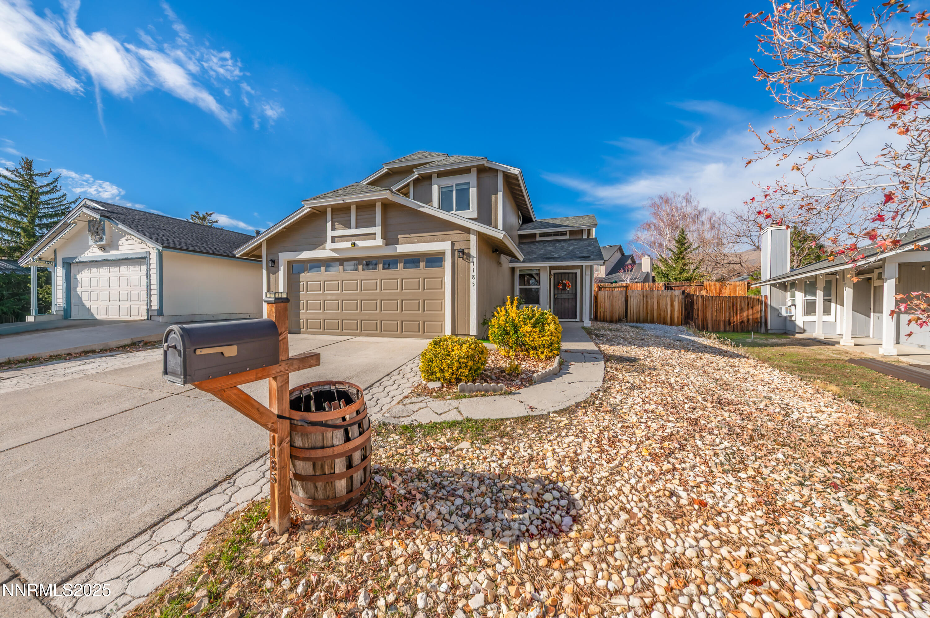 1185 Westlake Road Reno, NV 89523 - Photo 2 of 26 a front view of a house with a yard