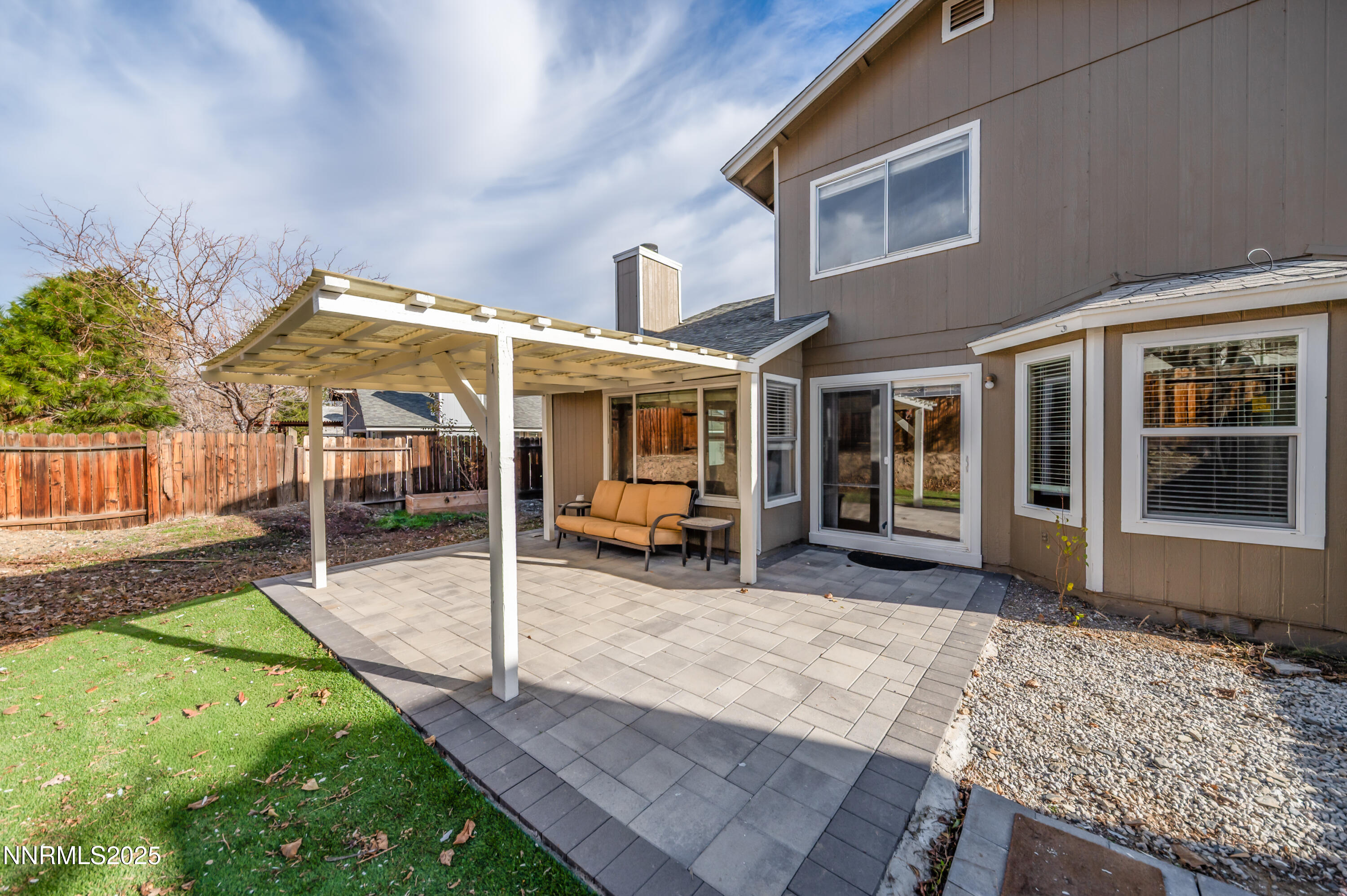 1185 Westlake Road Reno, NV 89523 - Photo 22 of 26 a view of a house with backyard porch and sitting area