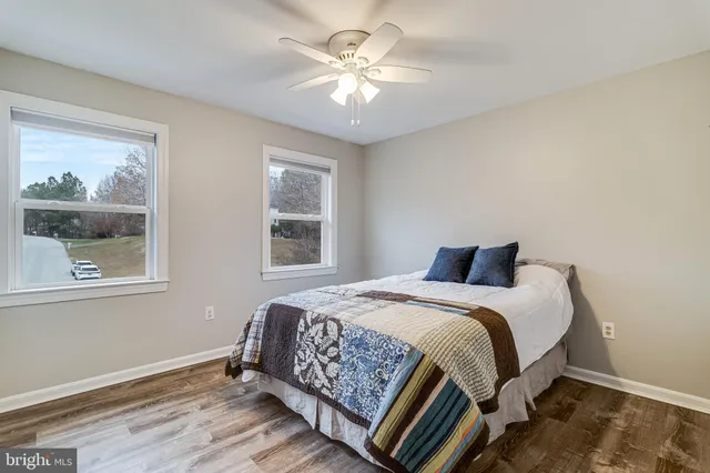 a view of a kitchen with a sink washer and dryer