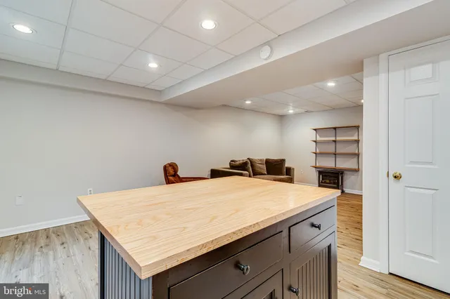 a view of a chairs and table on the deck