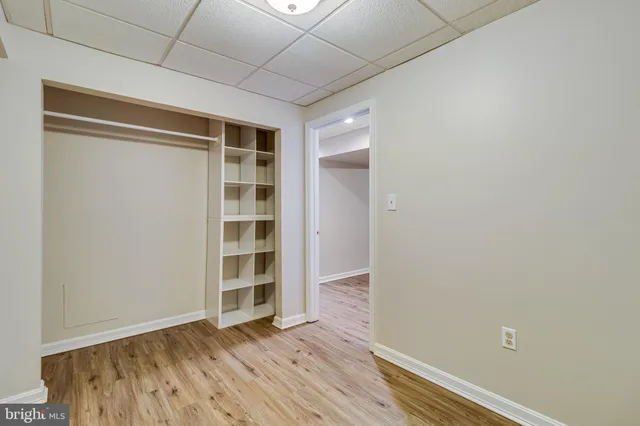 a view of balcony with wooden floor