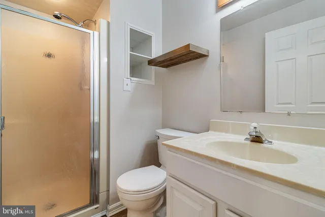 a view of a balcony with wooden floor