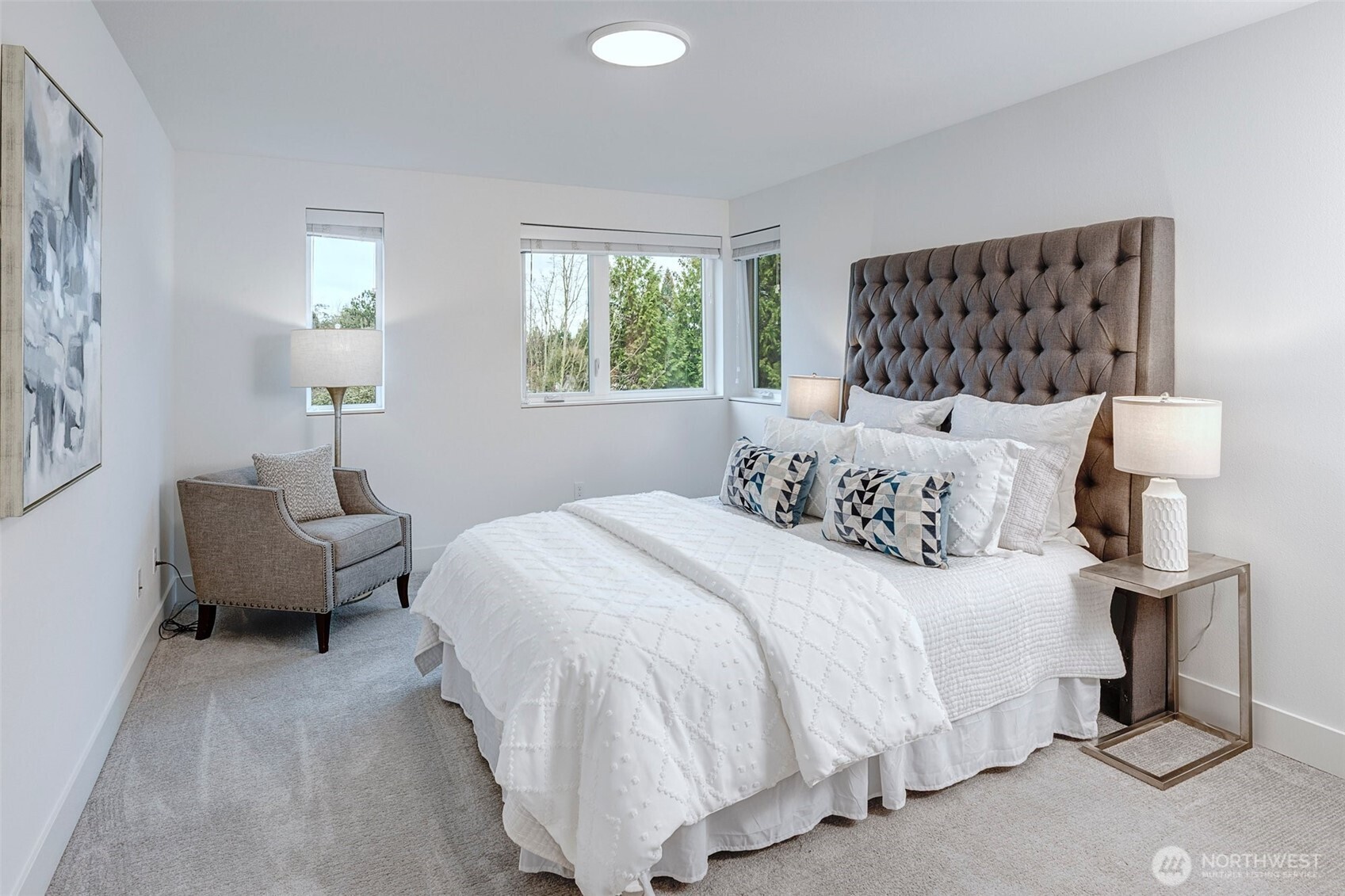 4274 Northeast 50th Street Seattle, WA 98105 - Photo 11 of 22 a bedroom with a bed and window