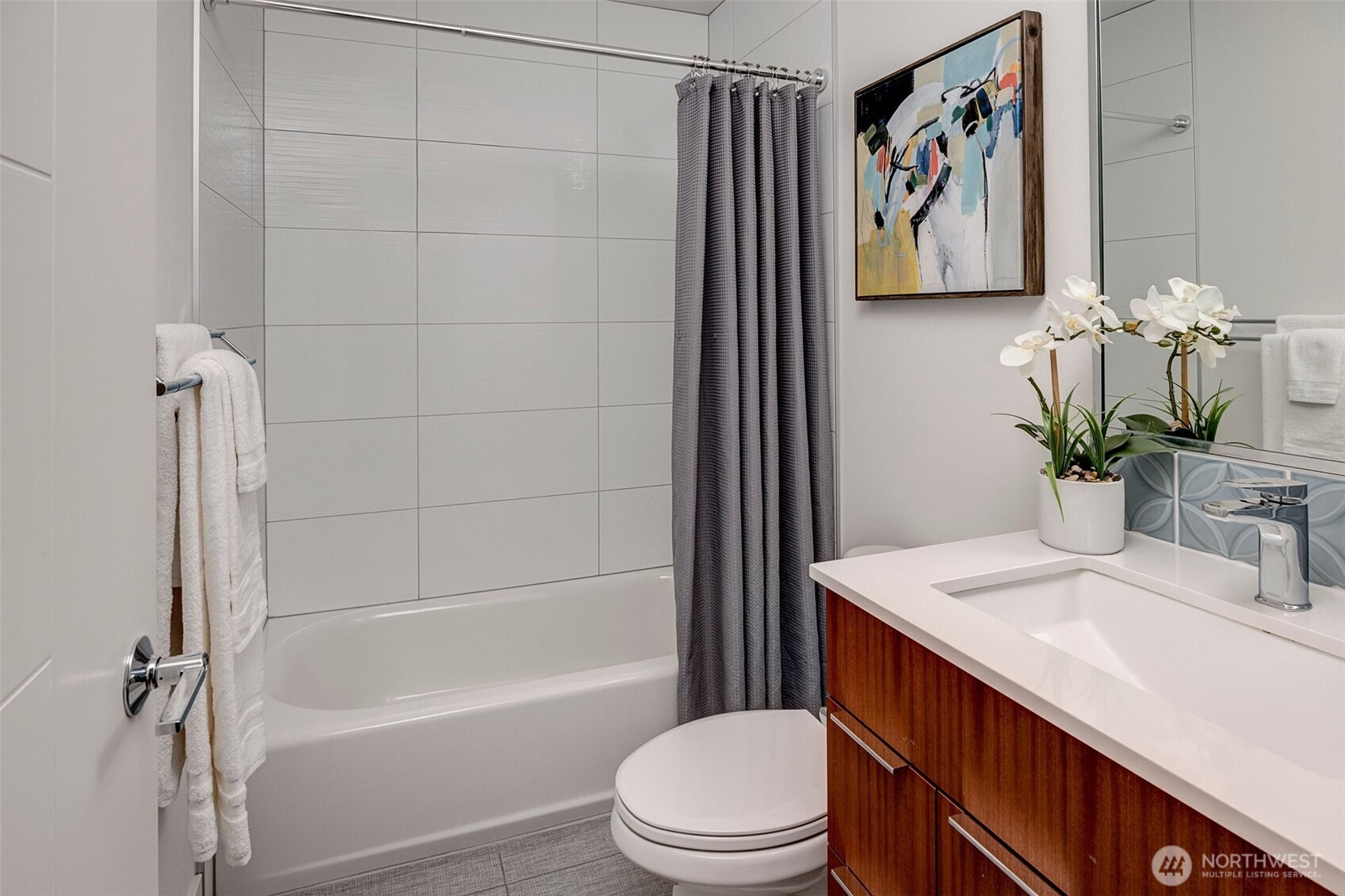 4274 Northeast 50th Street Seattle, WA 98105 - Photo 19 of 22 a bathroom with a sink a toilet and shower
