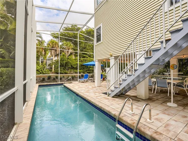 a view of a house with a swimming pool