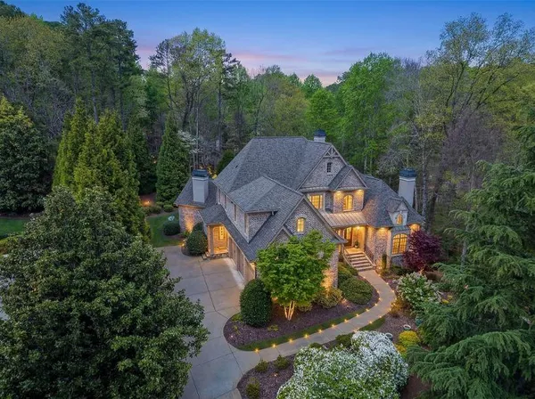 an aerial view of a house with a garden