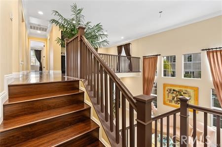 25724 Lewis Way Stevenson Ranch, CA 91381 - Photo 19 of 36 a view of entryway and hall with wooden floor