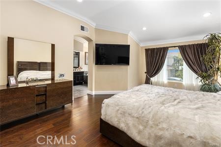 25724 Lewis Way Stevenson Ranch, CA 91381 - Photo 23 of 36 a bedroom with a bed and a flat screen tv