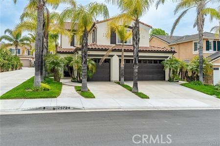 25724 Lewis Way Stevenson Ranch, CA 91381 - Photo 3 of 36 a view of entrance gate of house and car parked