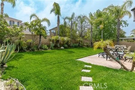a view of a backyard with a patio